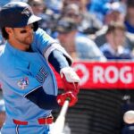 Blue Jays rally while Orioles' double-play attempt negated as umps rule infielder failed to try to tag runner